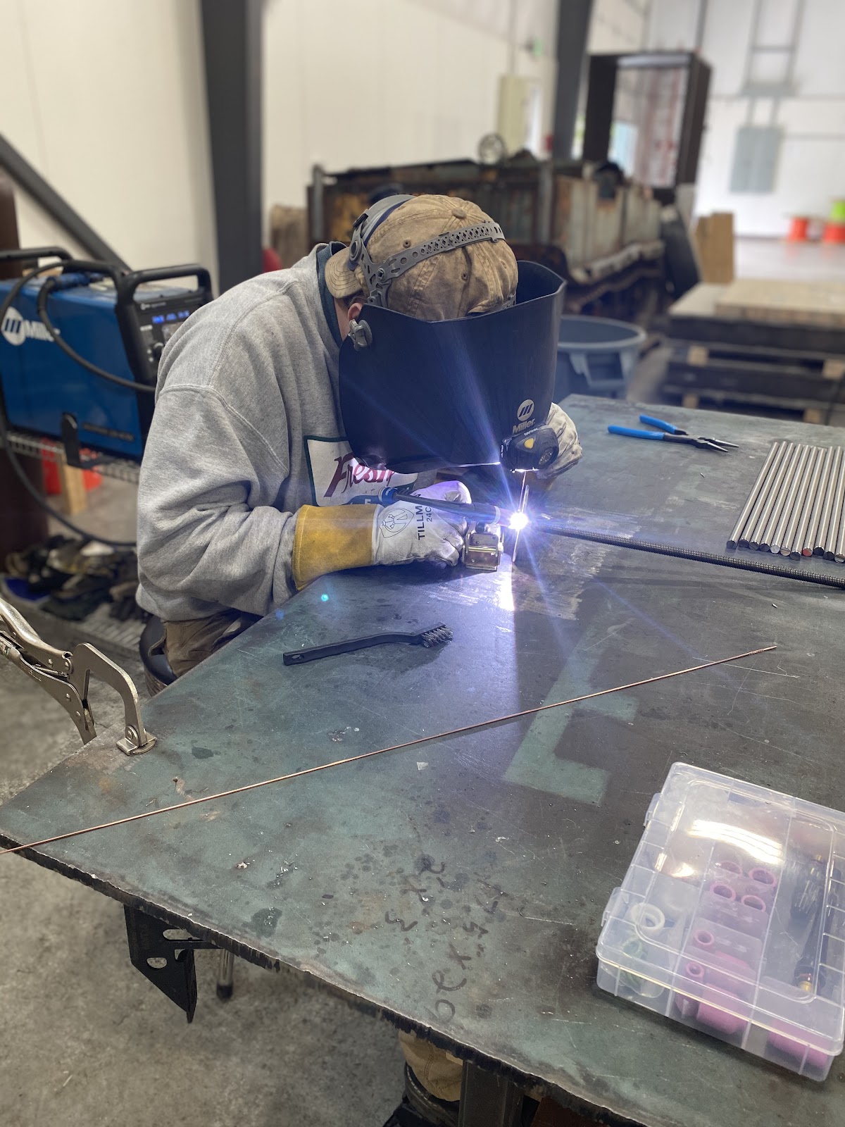 TIG welding in the shop, bright arc and filler rods